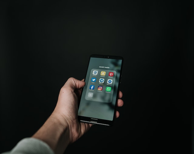 social media apps in a folder on a cellphone